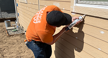 Solarity employee helping during a Habitat for Humanity build day