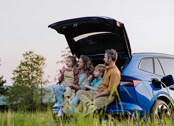 Family who skipped their auto payment sitting in back of SUV